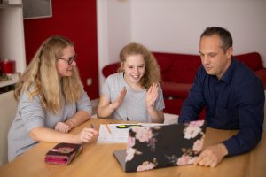 Parents communicating with their child.