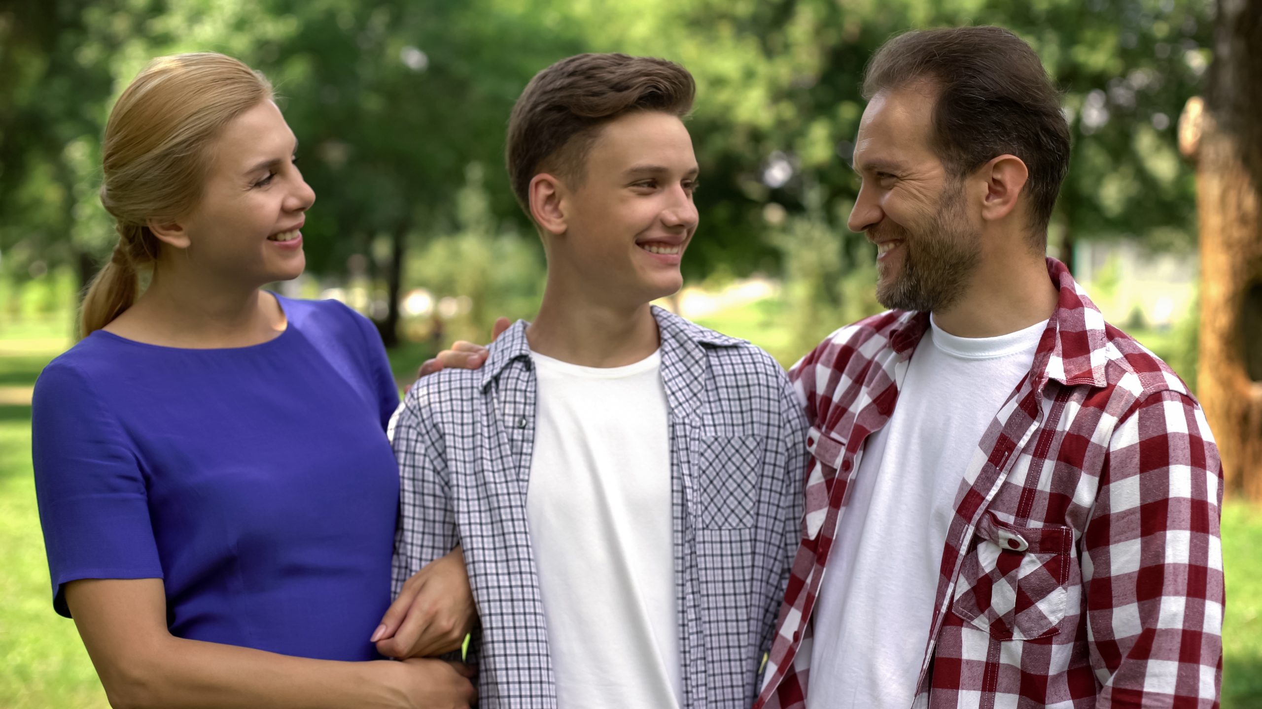 Parents successfully communicating with their teenaged son.